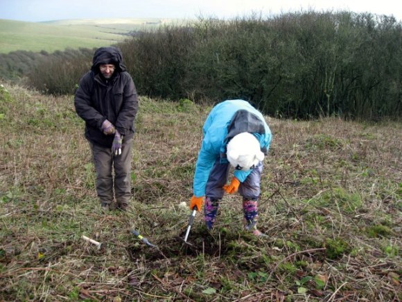 Looking E at my niece & myself finding the wall-line between garden and farm-yard; 13th January 2013.