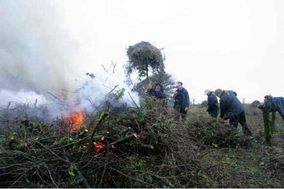 Looking NW at site clearance by burning of the cut vegetation; 10th January 2013