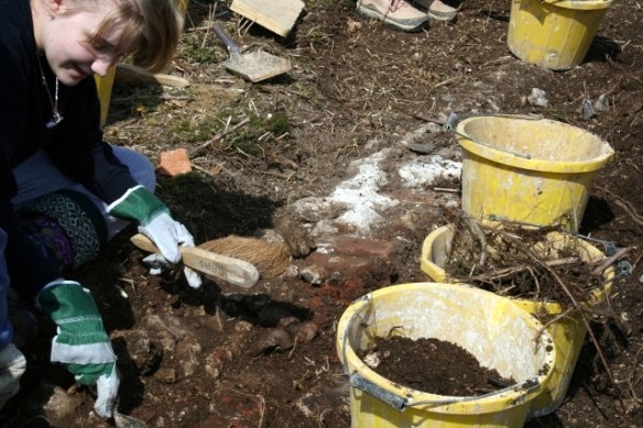 Uncovering the E wall of the house