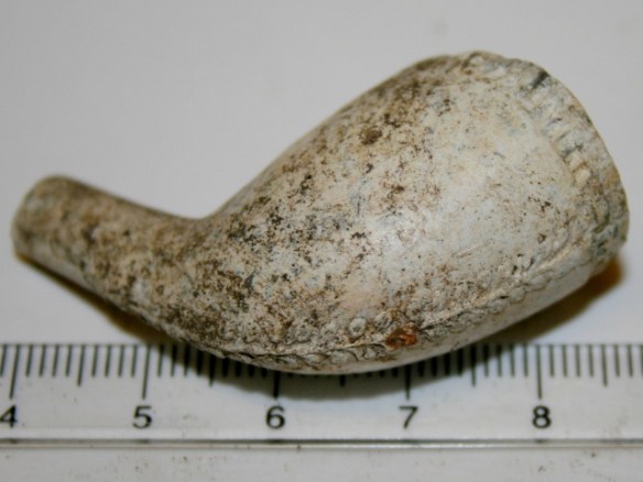 Decorated clay pipe bowl, 19th c.(?) from rubble mound