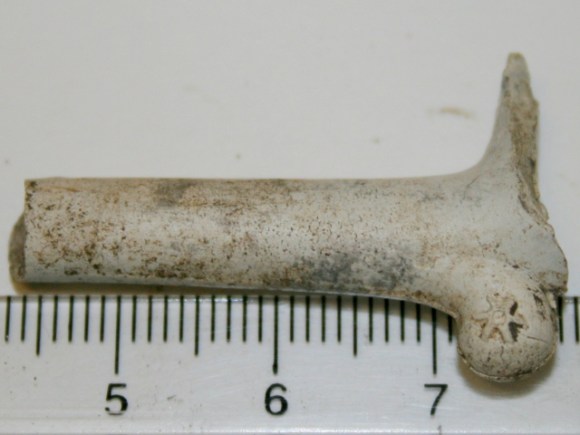 Clay pipe stem with star shaped makers mark on heel, 19th c.(?) from rubble mound