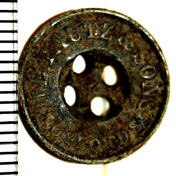 Tautz button from surface of rubble mound