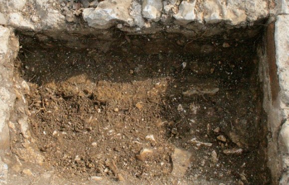 Foundations of inside of old SW corner of house
