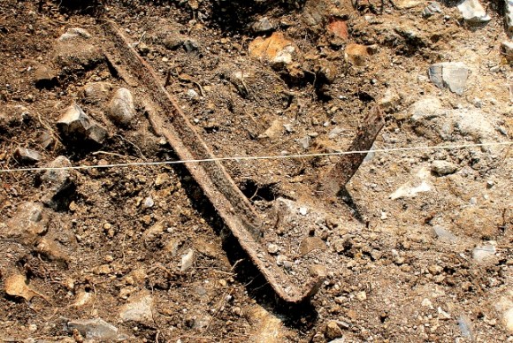 Pieces of iron in vicinity of outside toilet - photo slightly enhanced saturation
