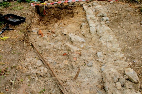 View looking S towards house from site of outside toilet