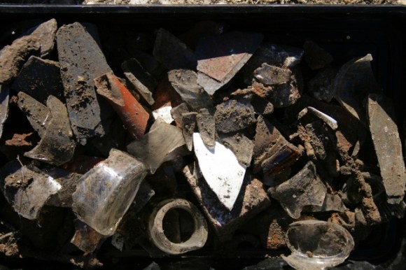 Finds, including brown teapot spout