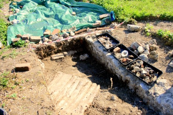 Corrugated iron sheet and other finds.