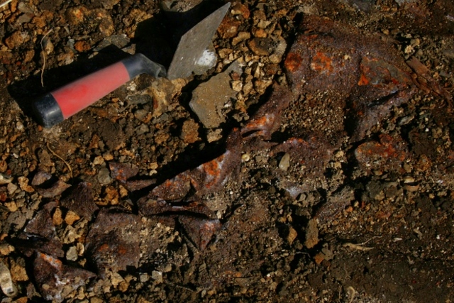 Metal container, from under corrugated iron sheet