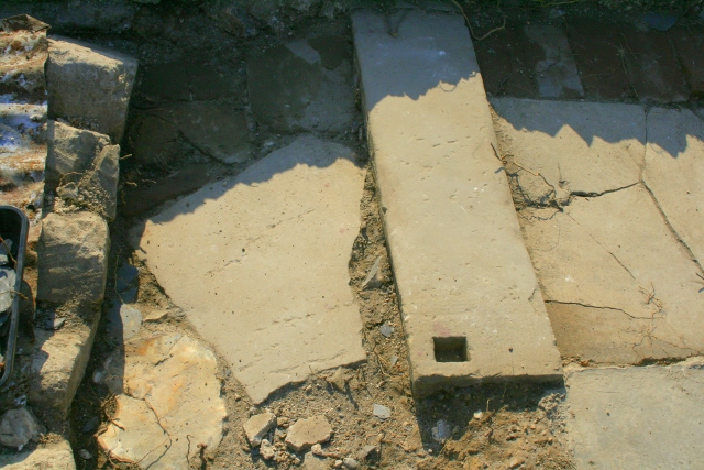 Stone/flint paved path to outside toilet
