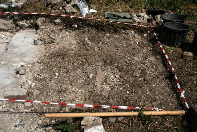 Demolition rubble, E of toilet, S of garden/boundary wall