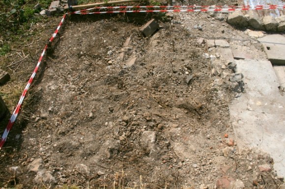 Demolition rubble E of toilet