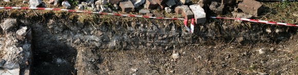 N boundary wall E of toilet