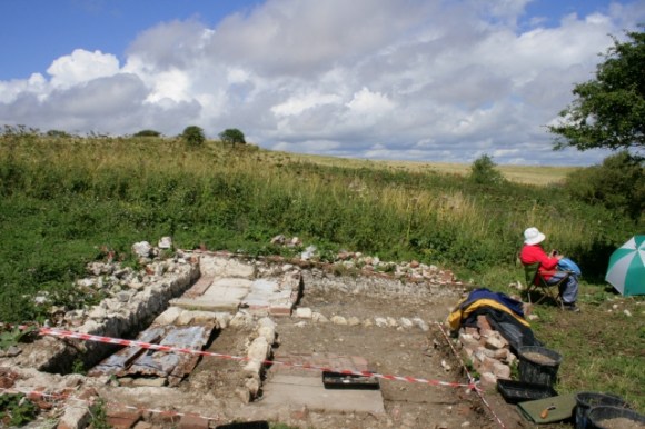 Looking N from inside the house over front door and edging stones to paths to toilet (left) and front garden gate (right)