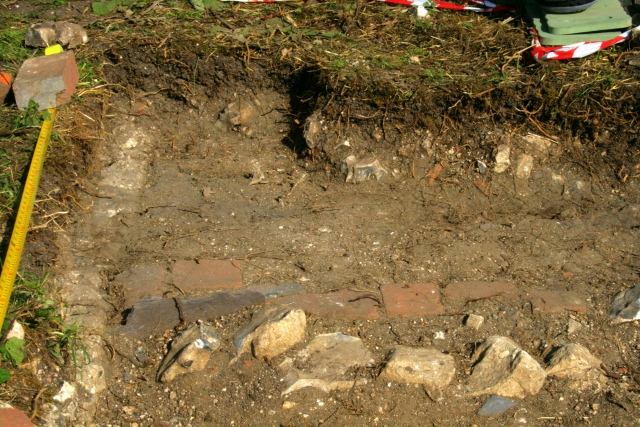 Looking E over path and front garden gateway