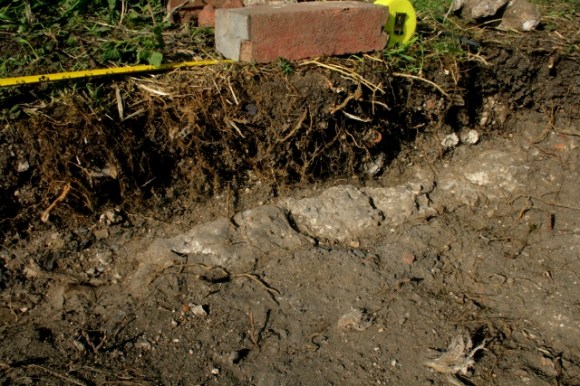 E side of site of garden gate