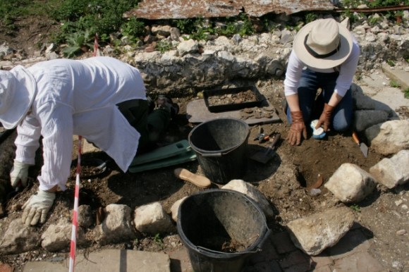 Garden W of front door, S of toilet