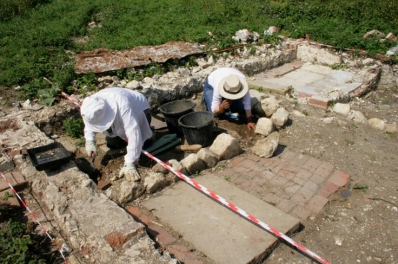 Cleaning up trench in garden W of front door step