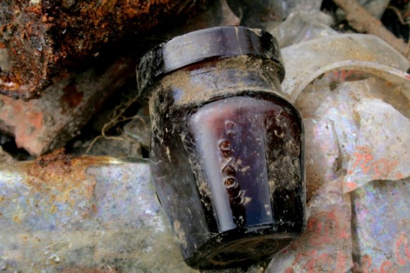 "OXO" bottle from drain