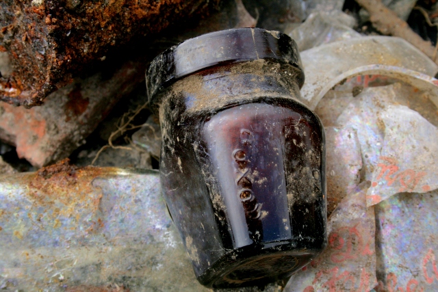 "OXO" bottle from drain