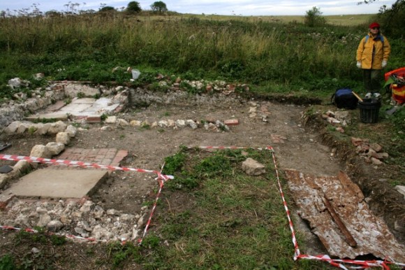 Looking N out of approx location of kitchen window over unexcavated area possibly containing underground water tank