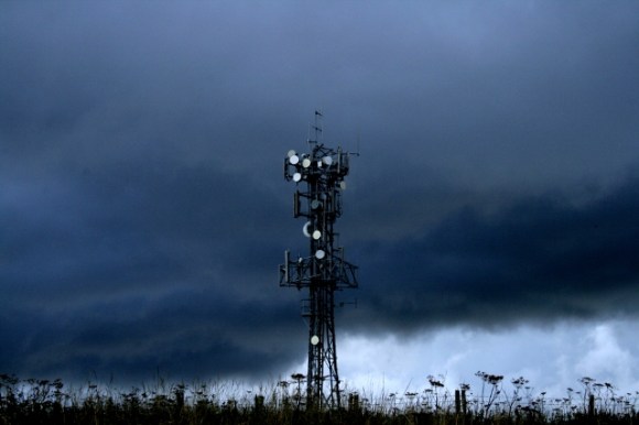 Dramatic sky beyond aerial W of site