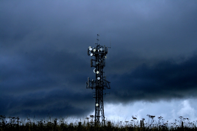 Dramatic sky beyond aerial W of site