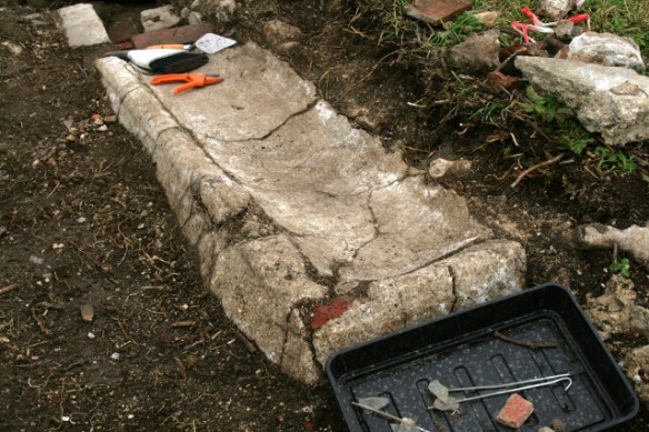 Looking SE at concrete gully outside kitchen/washhouse window