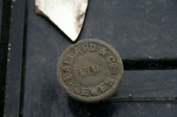 Black rubber screw threaded stopper for Ballard's beer bottle