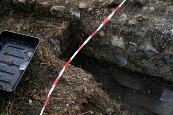 Looking SW at the SW end of the 'woodstore' and the outer face of the kitchen/scullery wall
