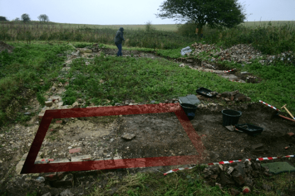 Looking N at approx location of E wall of S extension of cottage