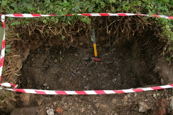 Looking S from concrete platform at 50cm extension by external face of E wall of cottage