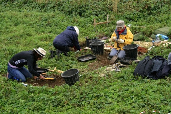 Looking SW at excavation of S end of cottage