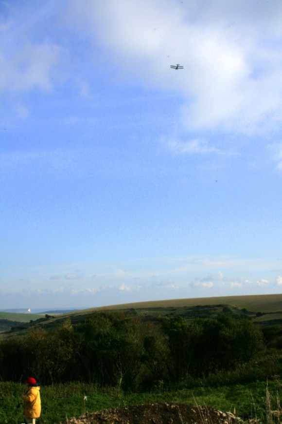 Biplane flypast over Newmarket Farm Dig