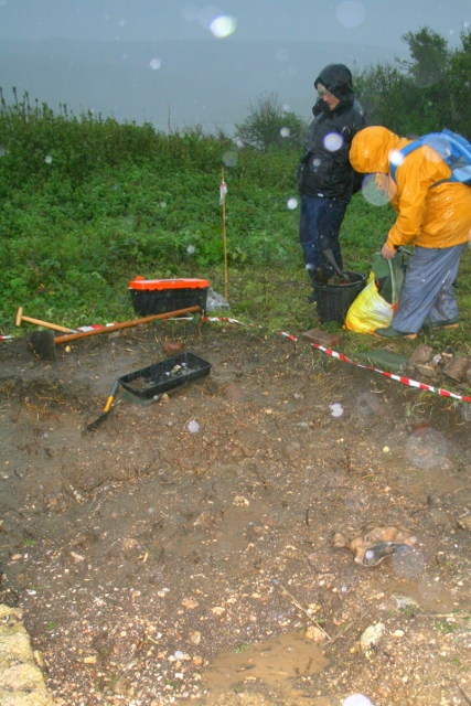 Looking SE at wet diggers from SW corner of cottage