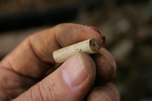 19thc clay pipe stem shard from partially excavated grid square S of cottage, E of ~1880 extension; 25th October 2013.