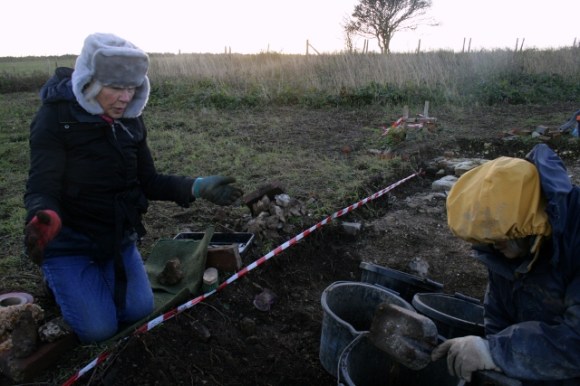 Looking SW at excavation of area E of extension, S of cottage