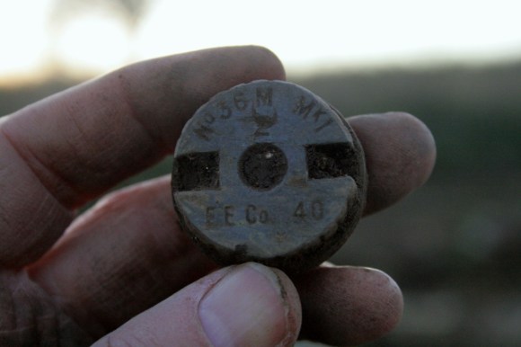 Screw threaded base of a 36M Mills Bomb
