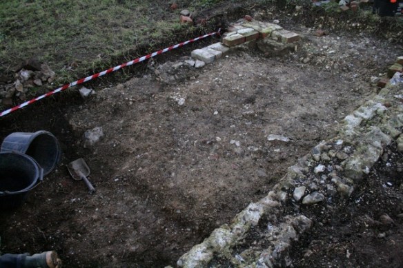 Looking SW at extension at S end of cottage