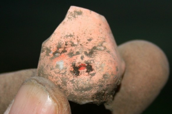 Cherubic face of ceramic doll