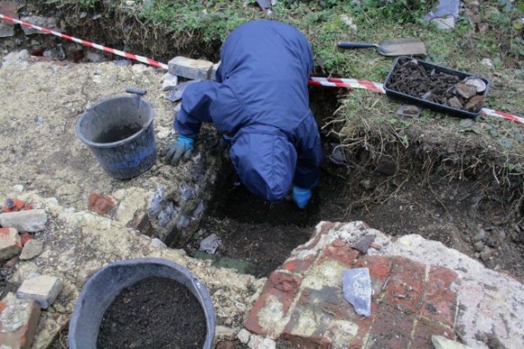 Looking NE at gap between bases of laundry copper and chimney