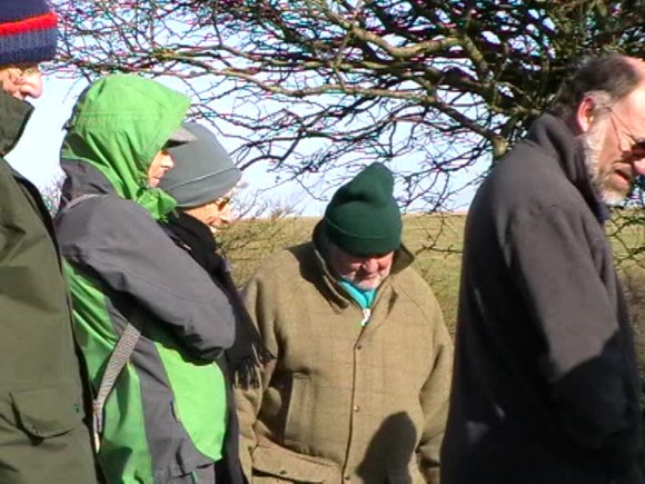 Some very well dressed guided tour attendees looking at some archaeology, 3/11/13