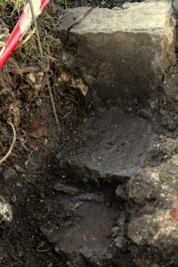 Looking W at possible in-situ brick and mortar structure S of SE corner of 'lean-to' extension