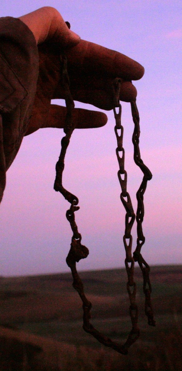 Copper alloy chain from excavation of demolition rubble from E of chimney base