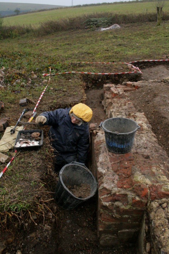 Looking S at excavation of E side of chimney