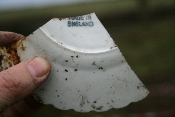 Ceramic shard with 'MADE IN ENGLAND' inscription
