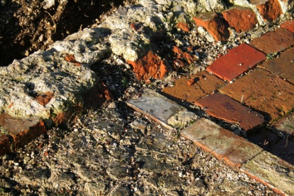 Looking NW at junction between N & S rooms of cottage