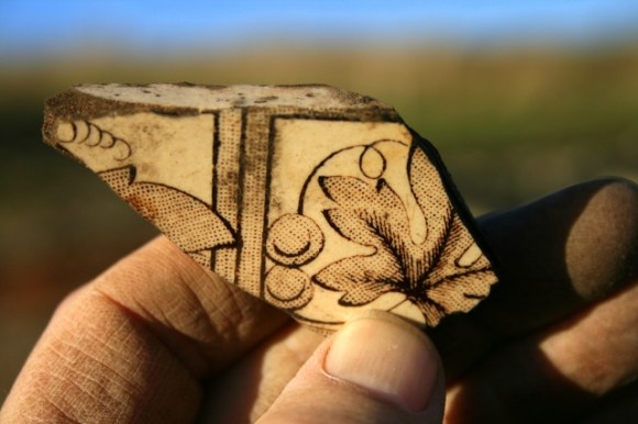 Part of gape vine decorated ceramic wall tile