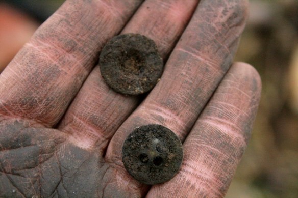 Buttons from mideen deposit E of chimney base