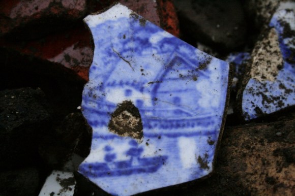 Ceramic shard from fill of construction trench for gully drain