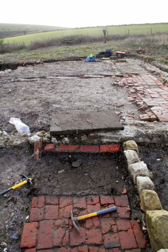 Looking S at removed front door step